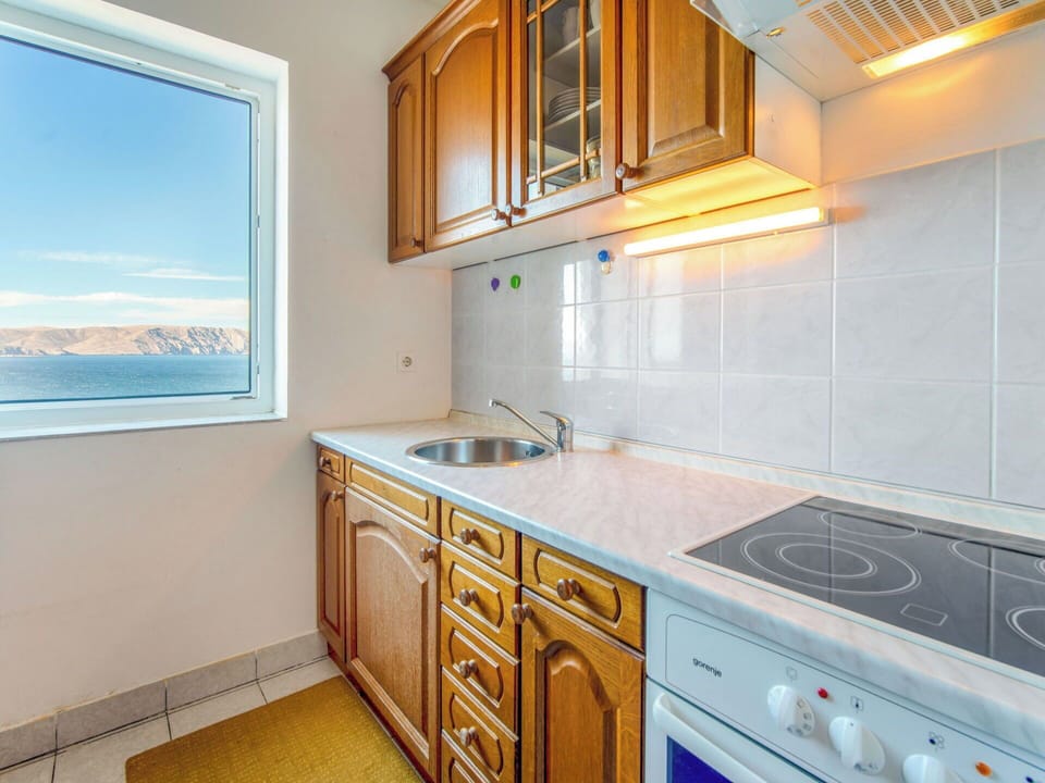 Kitchen, Flooring, Major Appliance, Kitchen Sink, Floor, Countertop, Cabinetry, Room, Ceiling, Apartment