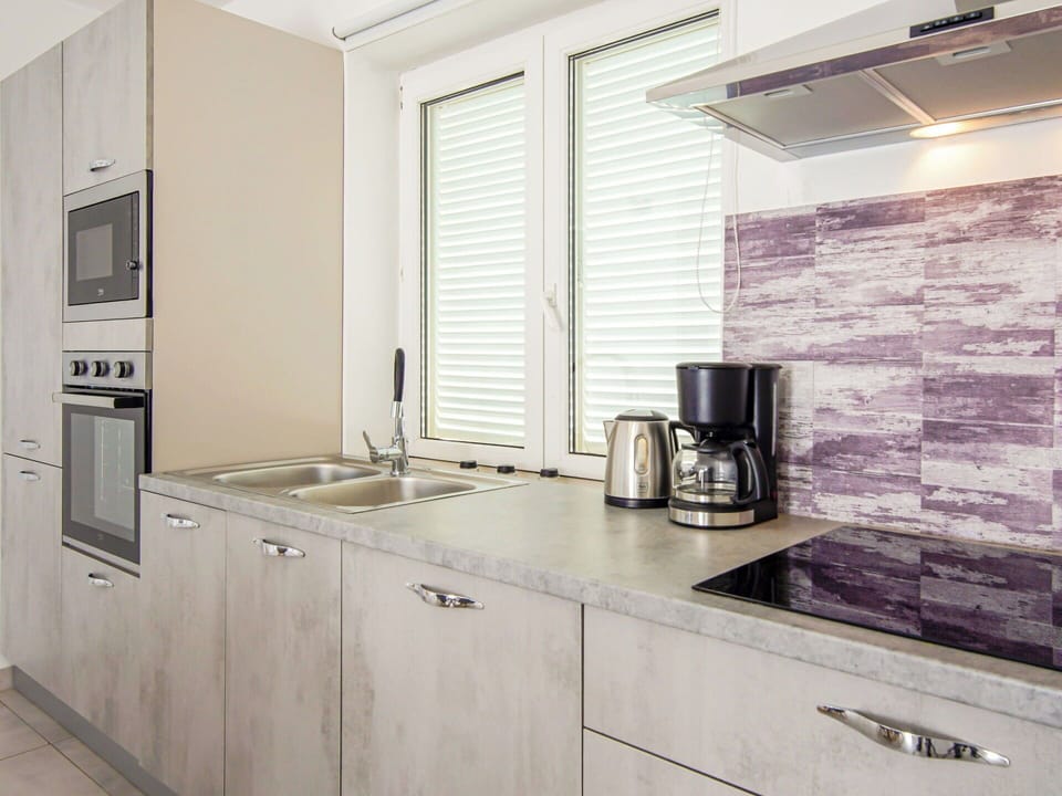 Kitchen, Countertop, Flooring, Interior Design, Cabinetry, Wood, Kitchen Appliance, Major Appliance, Furniture, Floor
