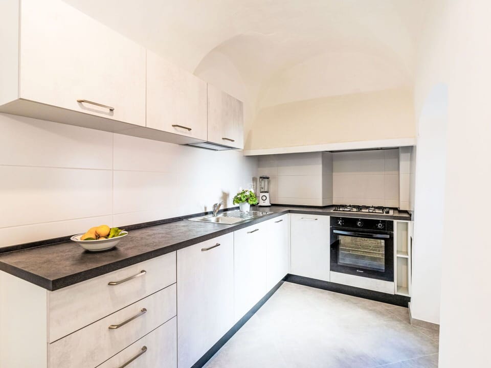 Kitchen, Kitchen Appliance, Countertop, Major Appliance, Interior Design, Cabinetry, Flooring, Ceiling, Kitchen Stove, Stove