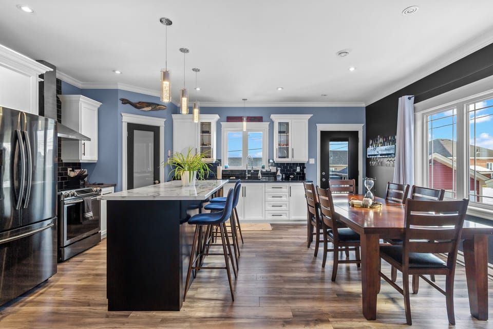 Modern open-concept kitchen with large island—perfect for cooking and gathering.