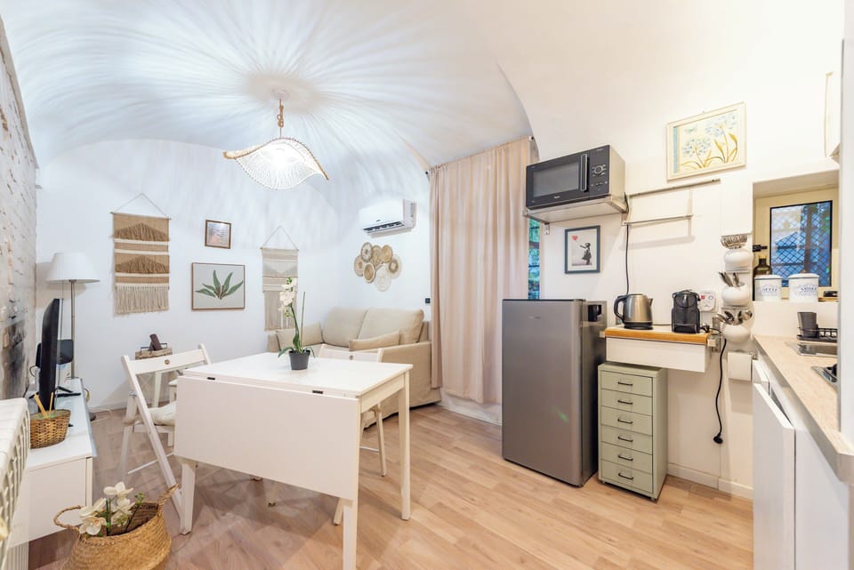 Apartment (1 Bedroom) | Living area | 32-inch Smart TV with cable channels
