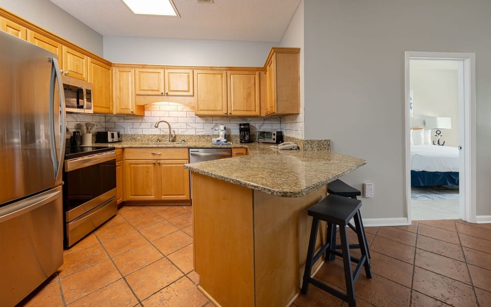 Condo, 2 Bedrooms | Private kitchen | Fridge, oven, coffee/tea maker