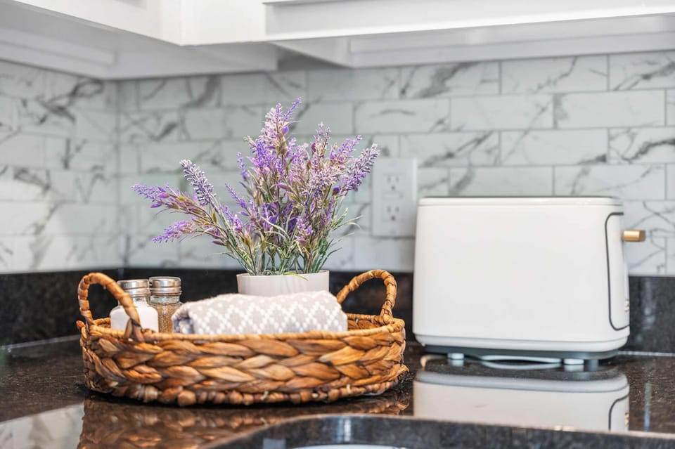 The open kitchen offers ample space & all the comforts of home​