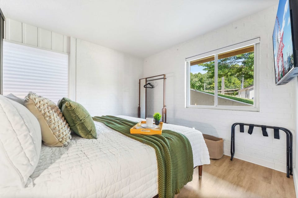 The primary king suite boasts a smart TV & ensuite bath​