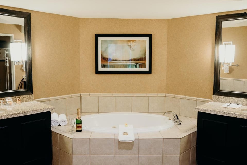 Separate tub and shower, deep soaking tub, designer toiletries