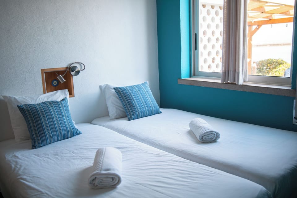 Quadruple Room, Bay View | In-room safe, iron/ironing board, free WiFi, bed sheets