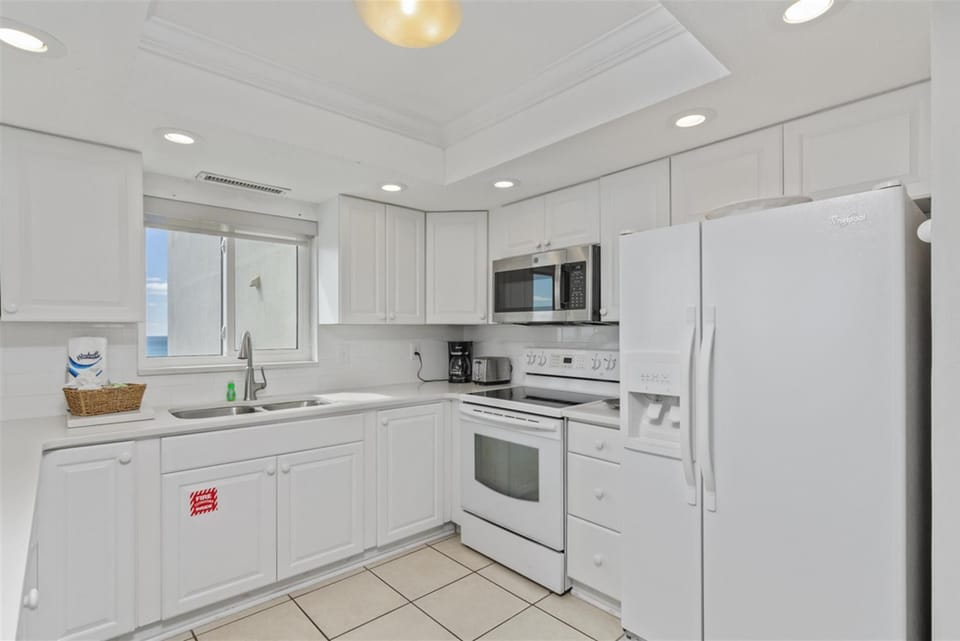 Your bright, fully-equipped kitchen invites you to prepare meals with all the comforts of home during your stay.