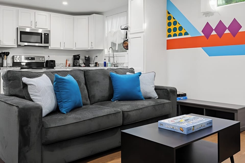 The open layout connects the living room and kitchen.