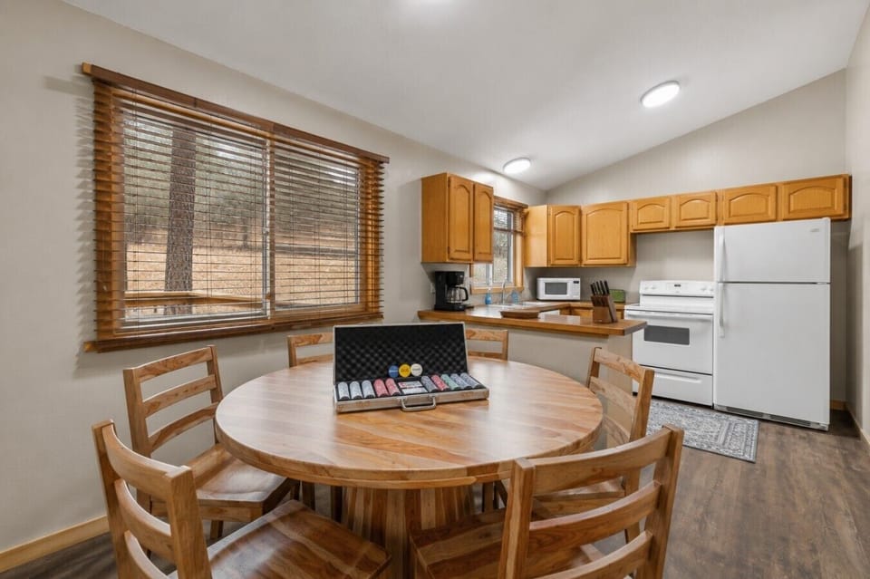 Gather, share, and savor. This cozy dining space is perfect for meals and mountain memories.