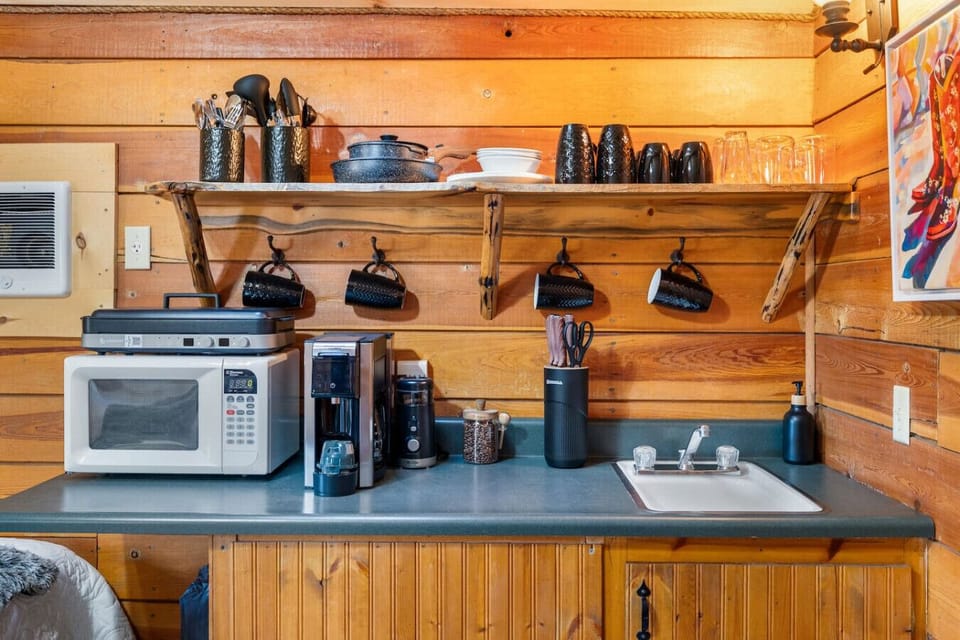Compact, functional, and full of charm—our kitchenette makes cabin living easy.