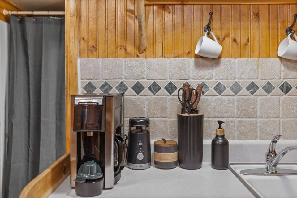 A dedicated coffee corner makes mornings simple and relaxing, with all essentials within reach.