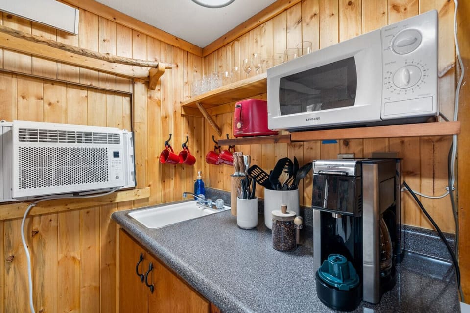 Start your mornings with the in-cabin coffee station and enjoy a kitchenette equipped with essentials for simple meals.