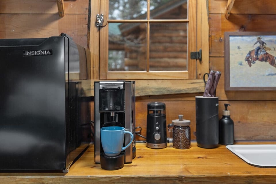 Enjoy your morning brew with a dedicated coffee corner, complete with a sink and all the essentials.