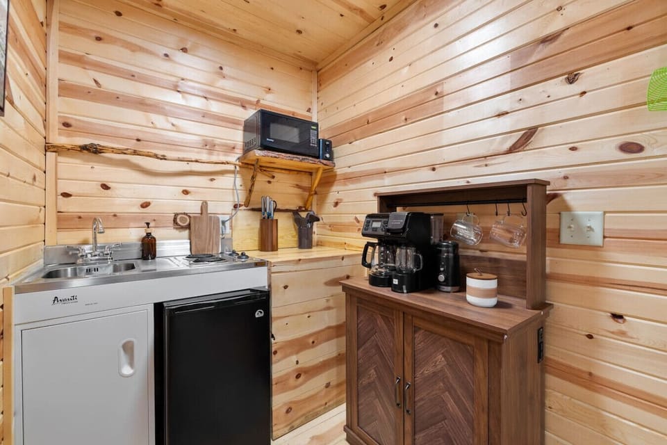 Compact cabin kitchenette and coffee station at Black Hills Bungalows, everything you need for a comfortable stay in the Black Hills, South Dakota near Mount Rushmore and Custer State Park.