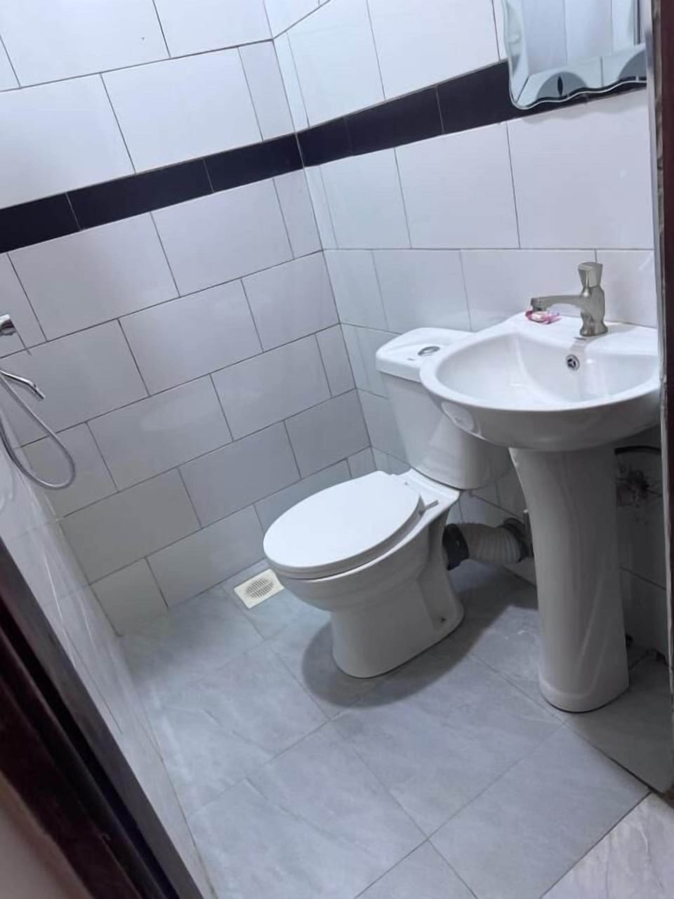 Shower, towels, soap, toilet paper