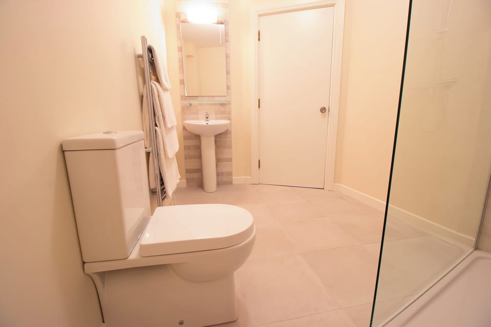 Shower, towels, soap, shampoo