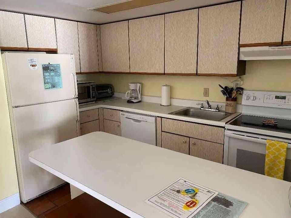 A well-equipped kitchen with all you need to whip up a quick meal or a tropical drink.