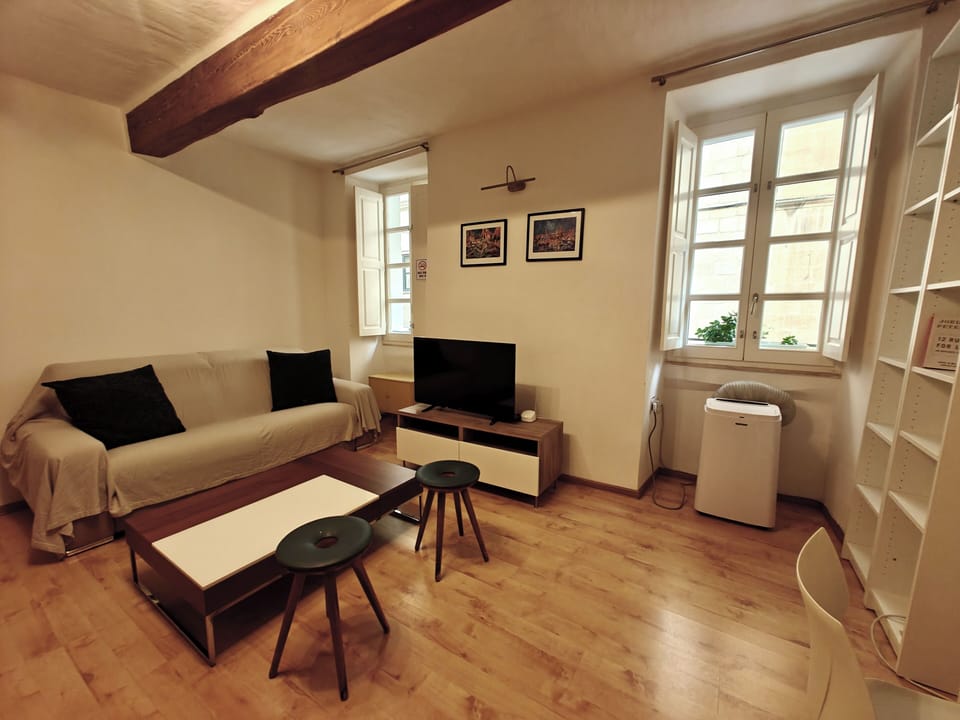 Apartment, City View | Living area | TV