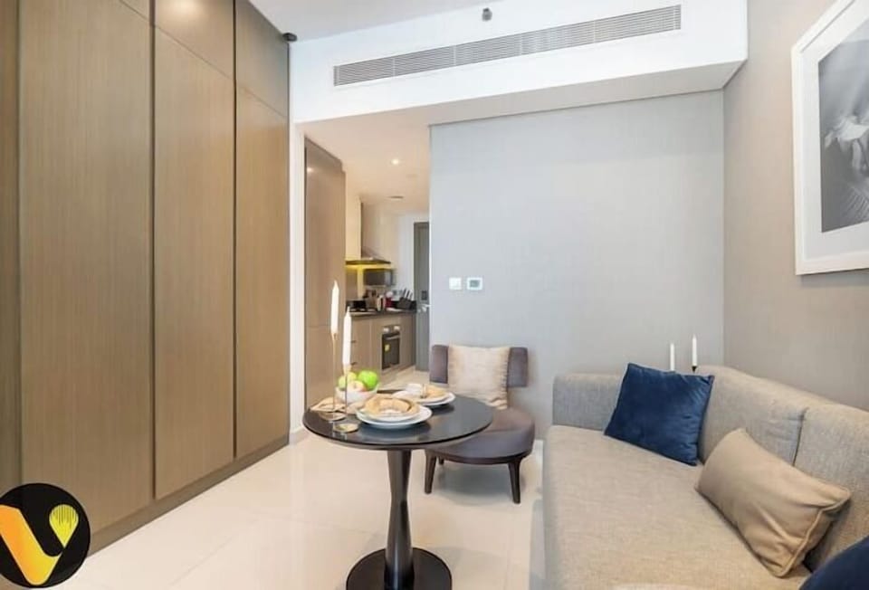 Luxury Studio, Balcony, Canal View | Living area | 55-inch Smart TV with cable channels