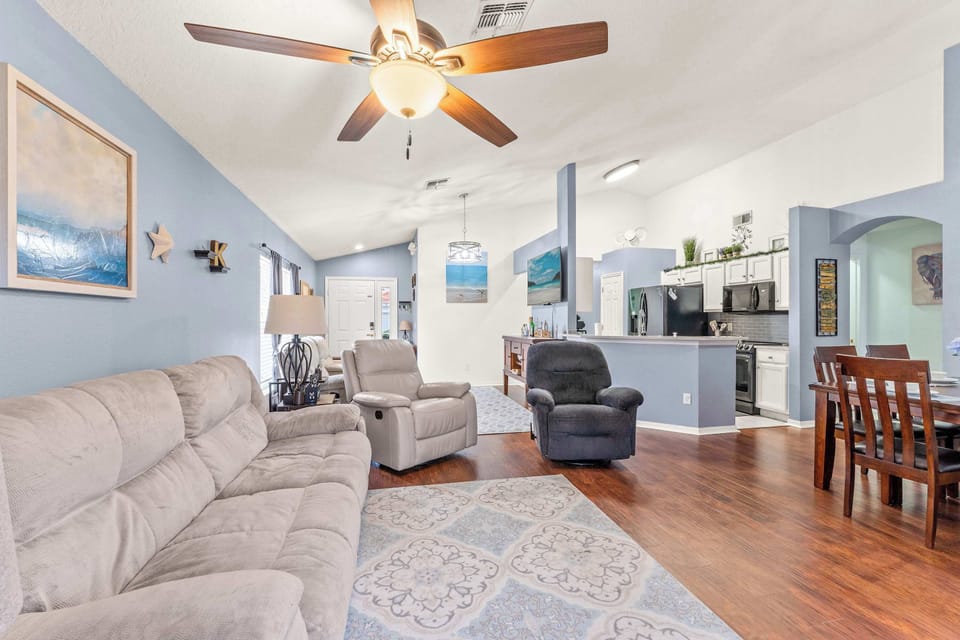 Relax in style in one of the two living spaces, featuring a Smart TV for streaming comfort