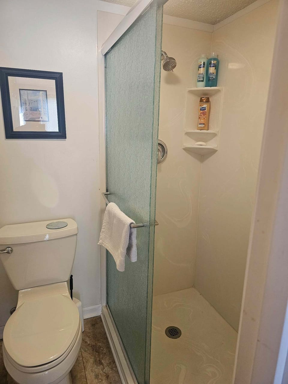 Master bathroom with walk in onyx shower