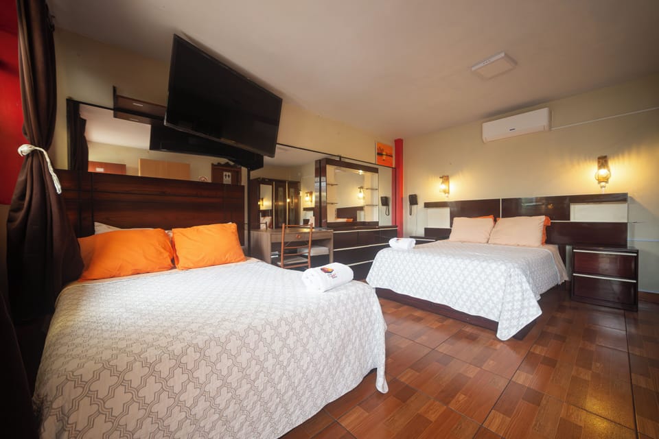 Superior Quadruple Room | Minibar, WiFi (free), bed sheets