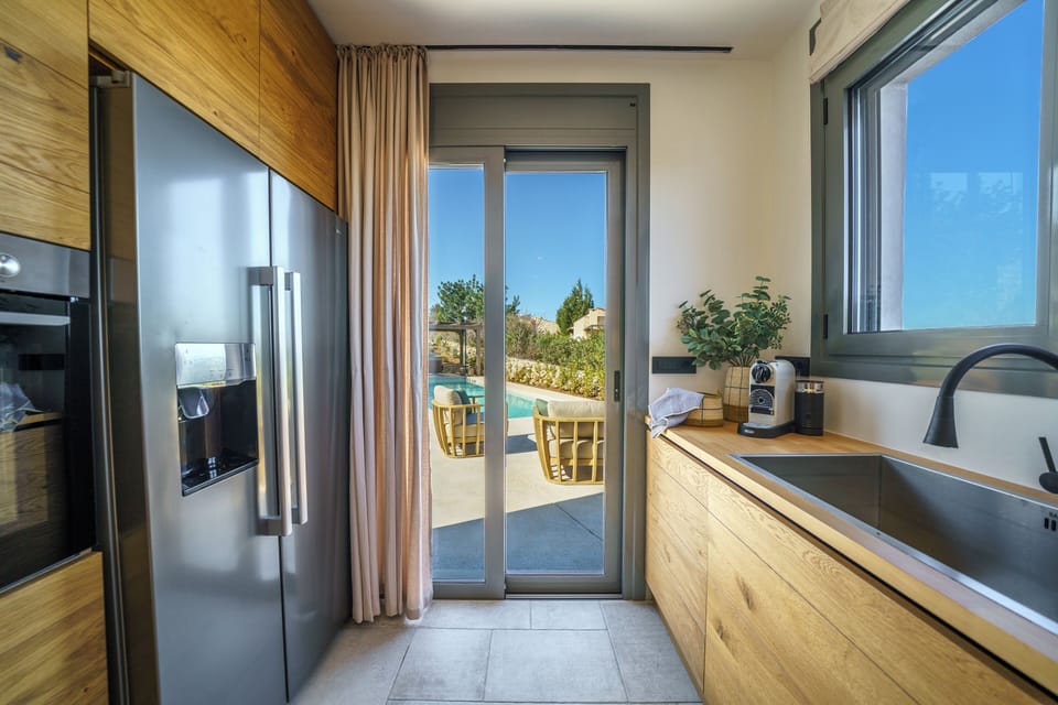 Luxury Villa | Private kitchen | Espresso maker, coffee/tea maker, electric kettle, highchair