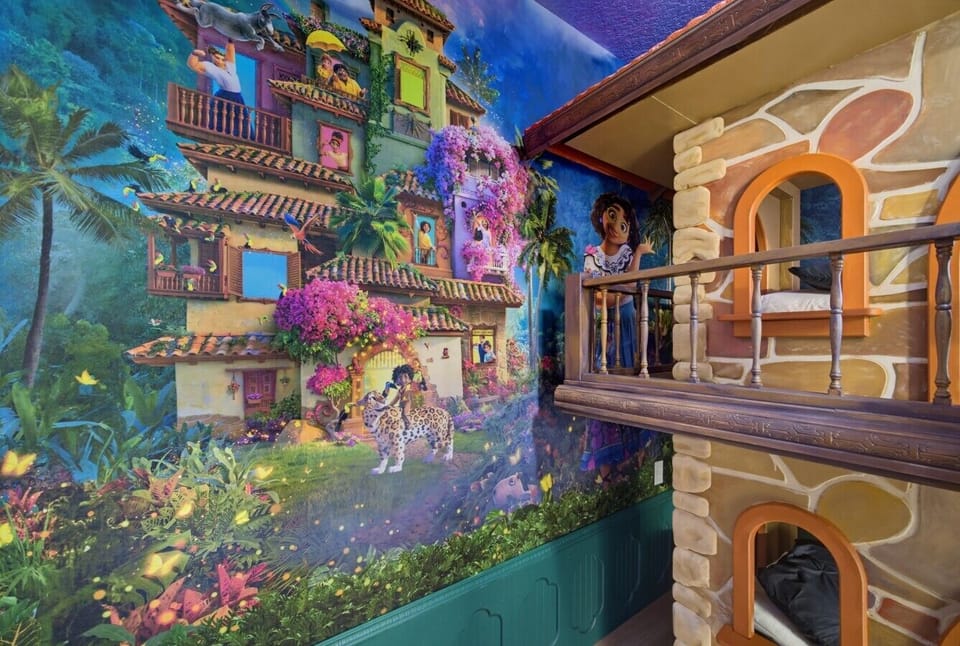 Storybook village mural and sleeping structure