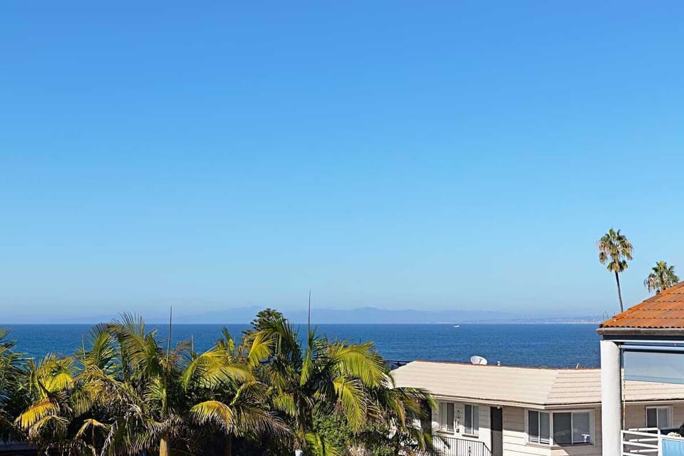 Wake up to breathtaking, unobstructed views of the sparkling ocean and swaying palms, the ultimate coastal backdrop for your stay.