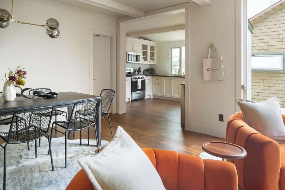 The flow of the home is highlighted by rich hardwood floors, and plenty of natural light, creating a warm and social atmosphere perfect for entertaining.