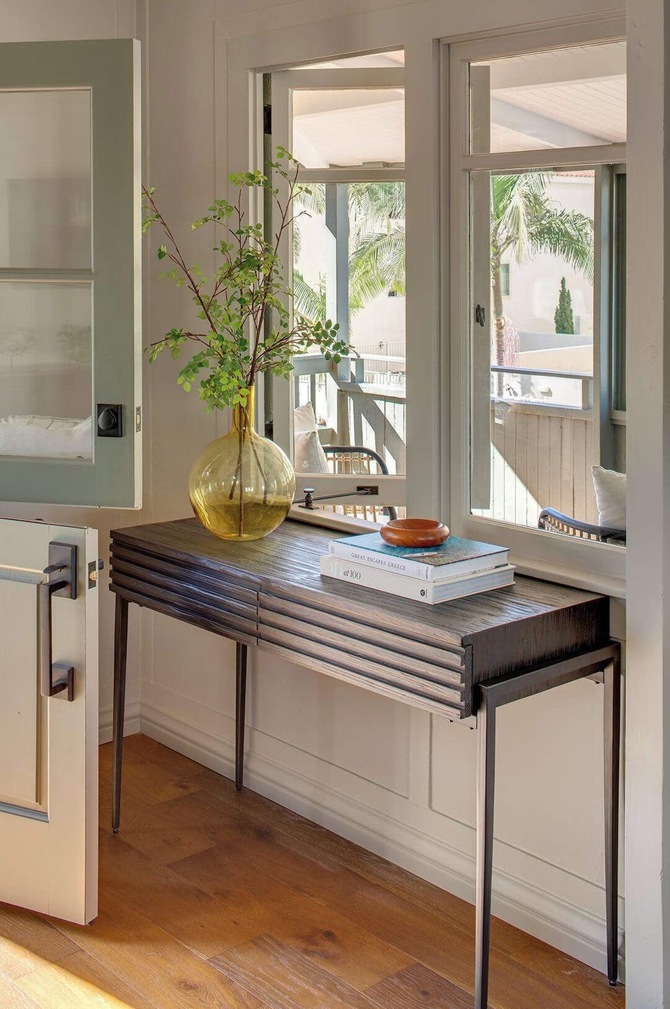 A stylish entryway that sits in natural light, offering a warm welcome as you step through the door. 