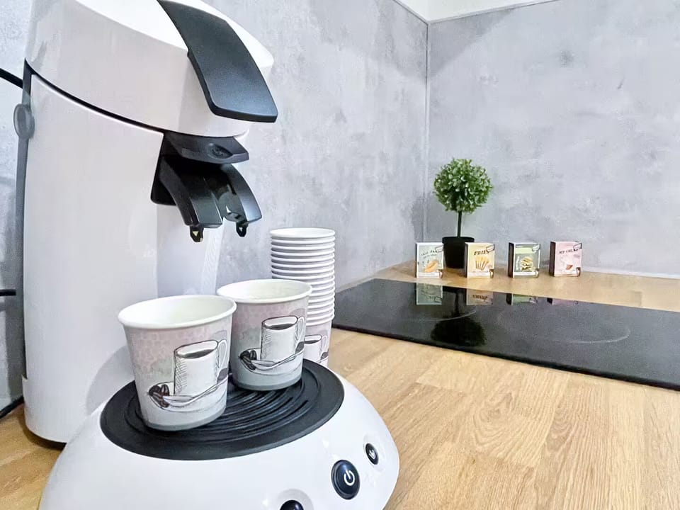 Deluxe Studio, Private Bathroom, City View | Coffee and/or coffee maker