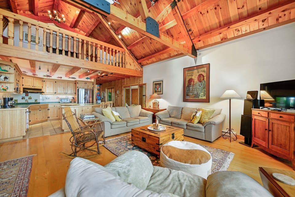 Living room with open concept to dining room and kitchen