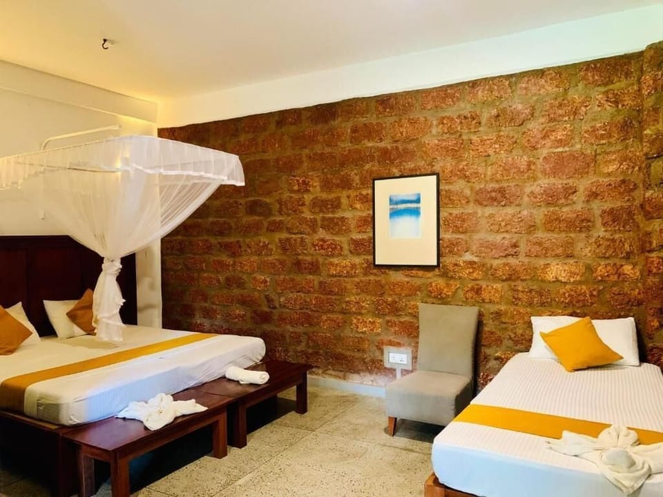 Comfort Quadruple Room, Balcony, Garden View | Desk, laptop workspace, iron/ironing board