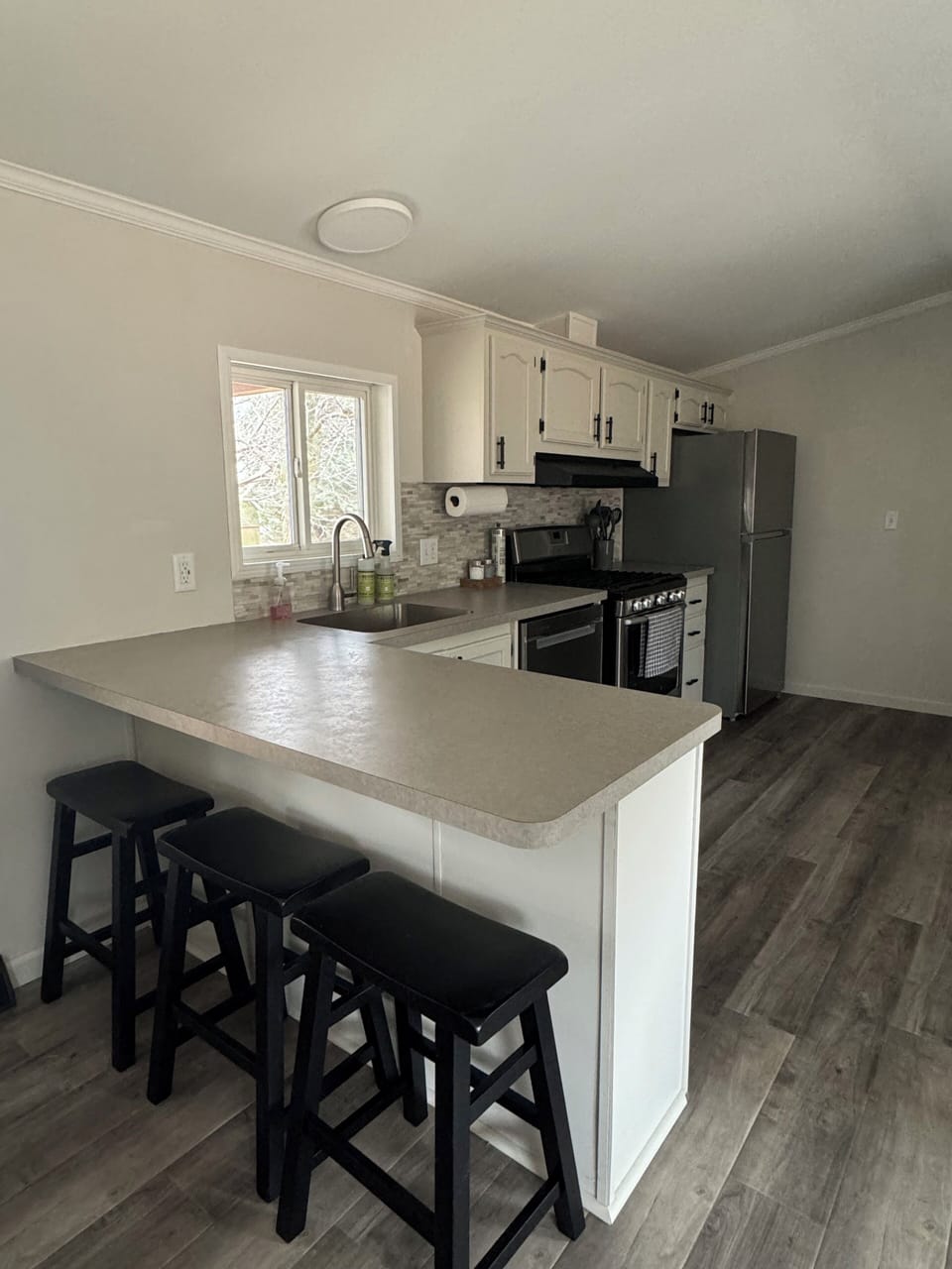 Full kitchen with stainless steel appliances