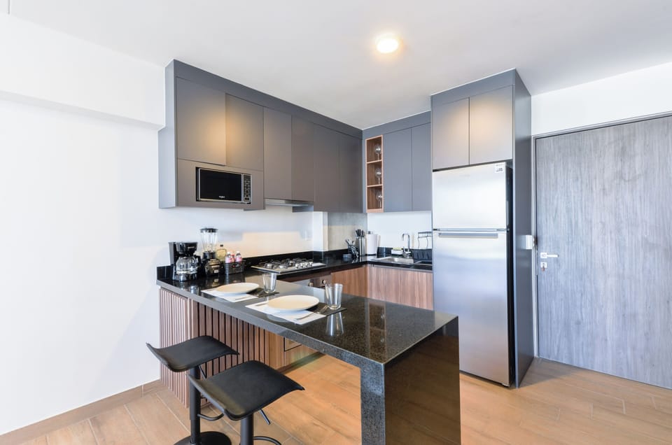 Club Suite, City View | Private kitchen | Full-size fridge, microwave, stovetop, blender