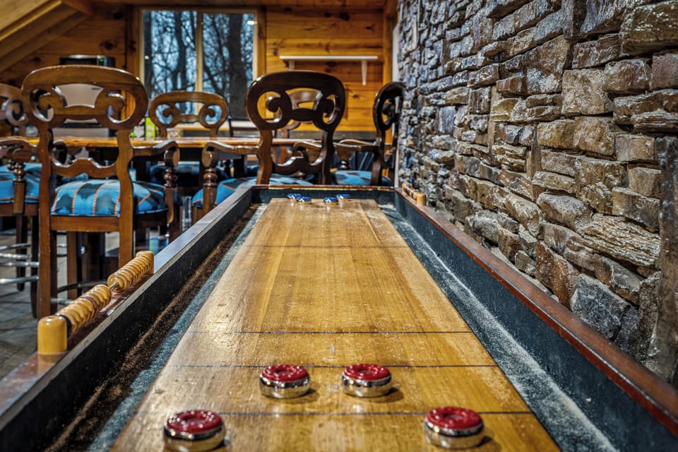 Challenge your friends to the great game of shuffleboard!