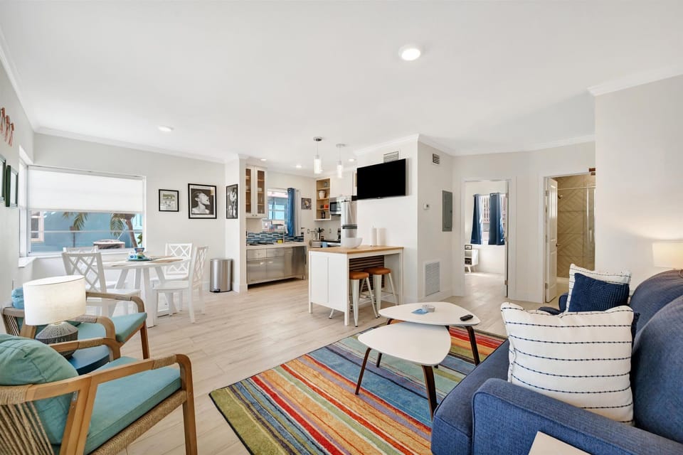 Spacious gathering area connected to the kitchen and dining space