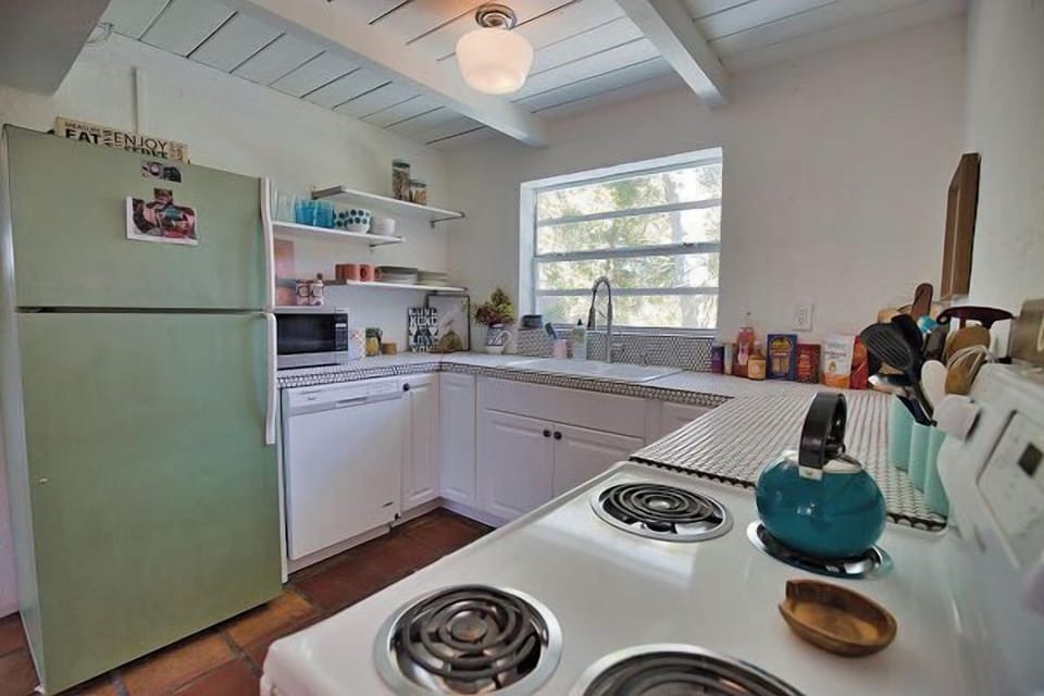 Vintage-style kitchen with retro refrigerator