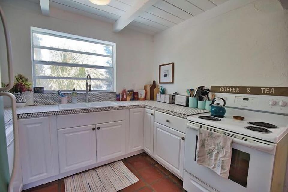 Charming kitchen with classic tile and natural light