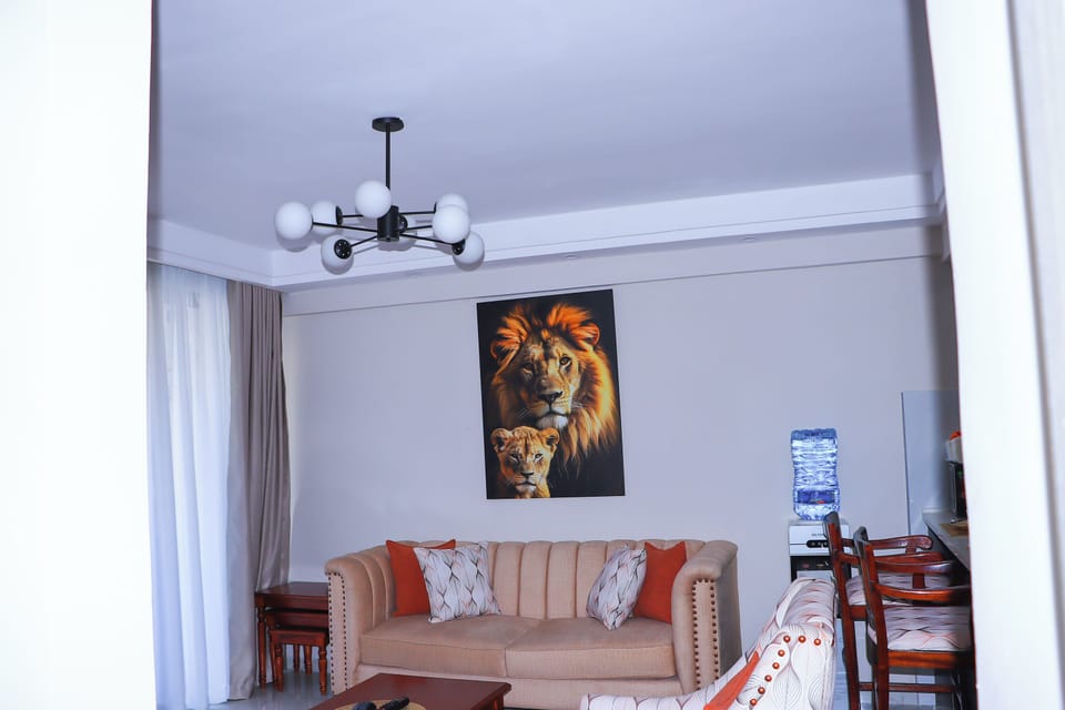 Apartment, Balcony, City View | Living area | TV