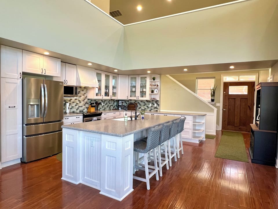 This open concept kitchen has the ideal layout to cook and hangout
