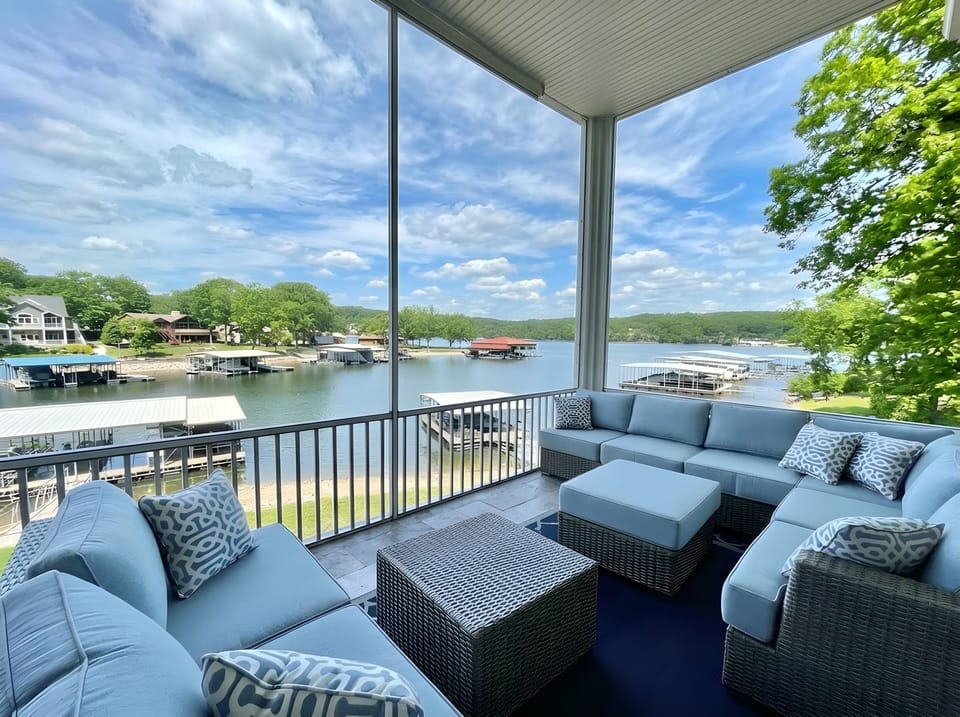  A cozy sectional perfectly placed in a screened in porch
