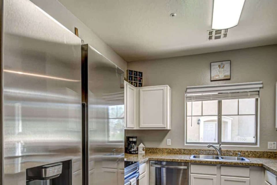 Fully equipped kitchen with modern appliances, perfect for home cooking.