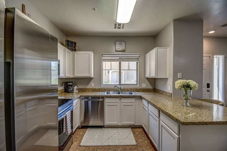 Fully equipped kitchen with modern appliances, perfect for home cooking.