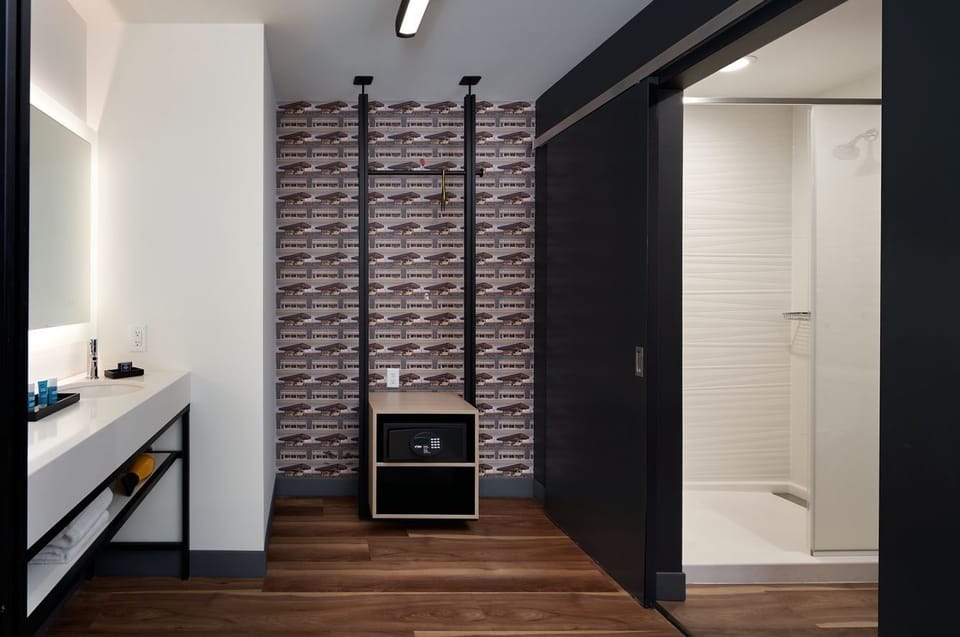 Refresh in a sleek, spa-like bath with modern finishes.