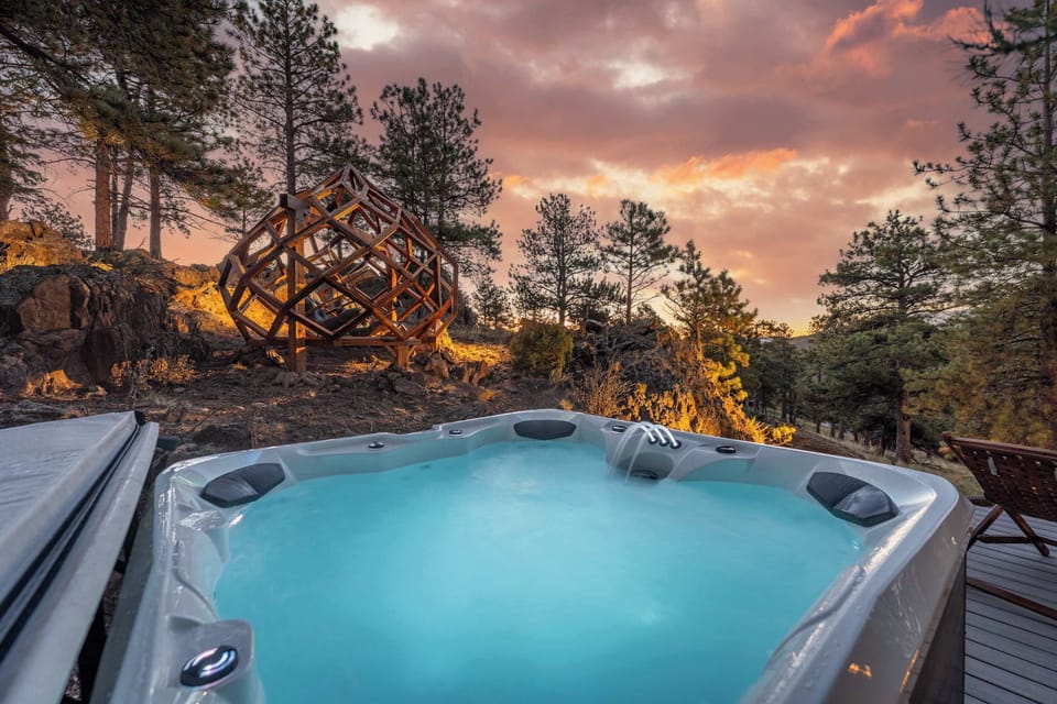 Cedar Dome Lounge Under the Stars – Sway in hanging chairs, sip something warm, and watch the mountains rest while visiting with loved ones soaking in the hot tub.