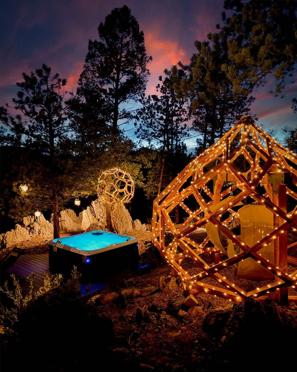 Your Private Mountain "Hot Spring" – Soak beneath the stars among mossy rocks with dreamscape lighting.