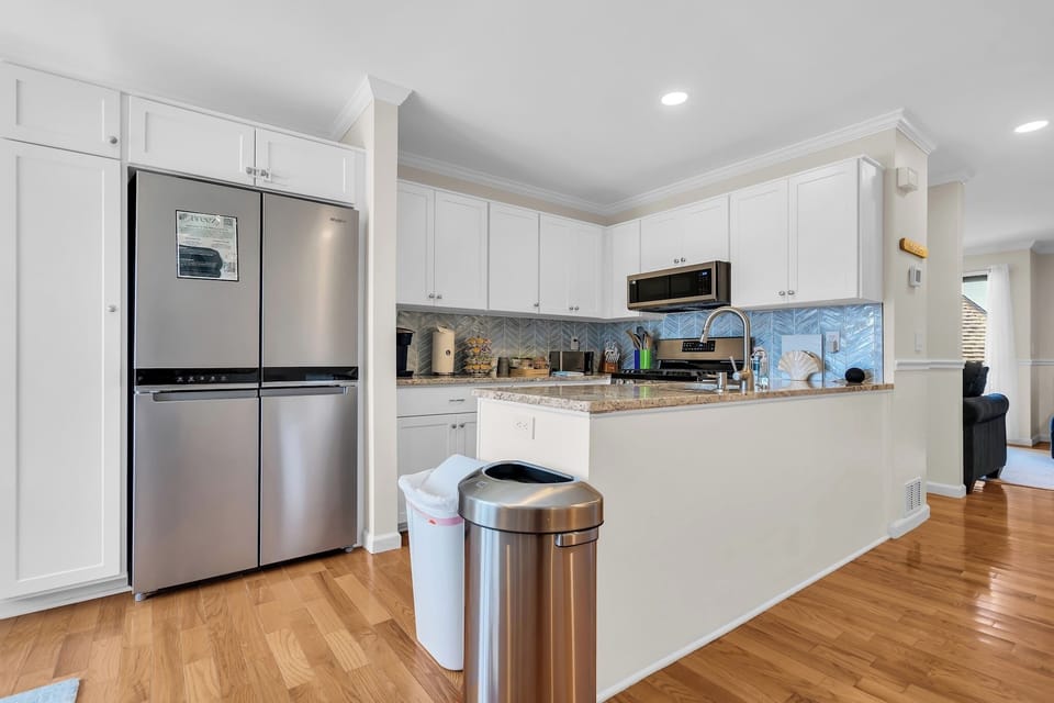 Bright modern kitchen with stainless appliances and spacious counters