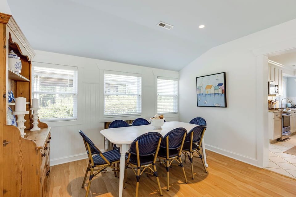 Dining Room: Sunlit dining area with charming decor, perfect for memorable meals and laughter!